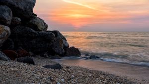 Preview wallpaper coast, rocks, sea, water, waves, sunset