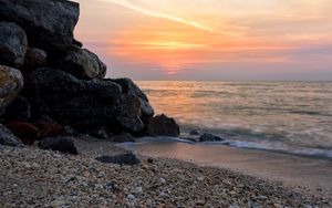 Preview wallpaper coast, rocks, sea, water, waves, sunset