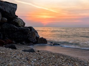 Preview wallpaper coast, rocks, sea, water, waves, sunset