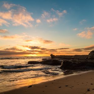 Preview wallpaper coast, rocks, sea, sunset, nature