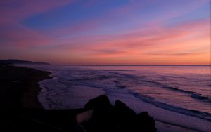 Preview wallpaper coast, rocks, sea, water, sunset, dark