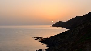 Preview wallpaper coast, rocks, sea, twilight, nature