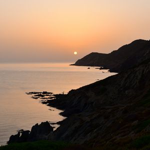 Preview wallpaper coast, rocks, sea, twilight, nature