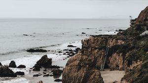 Preview wallpaper coast, rocks, stones, sand, sea