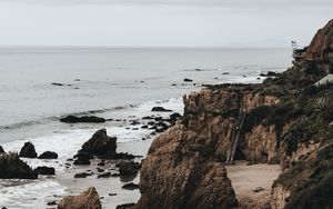 Preview wallpaper coast, rocks, stones, sand, sea