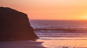 Preview wallpaper coast, rocks, sunset, sand