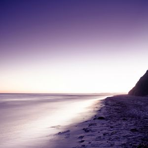 Preview wallpaper coast, sand, beach, rock, lilac