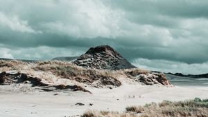 Preview wallpaper coast, sand, grass, hill, rock