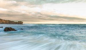 Preview wallpaper coast, sand, sea, rocks, stones, horizon