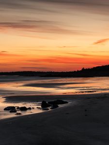 Preview wallpaper coast, sand, stones, sea, trees, sunset