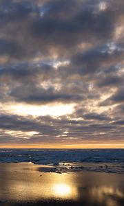 Preview wallpaper coast, sand, water, clouds, sun, twilight, reflection