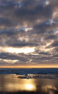 Preview wallpaper coast, sand, water, clouds, sun, twilight, reflection