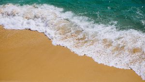 Preview wallpaper coast, sand, wave, foam, sea