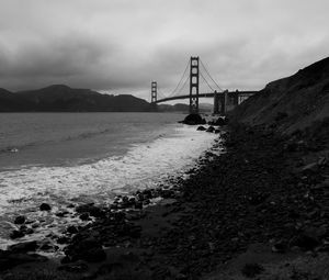 Preview wallpaper coast, sea, bridge, black and white