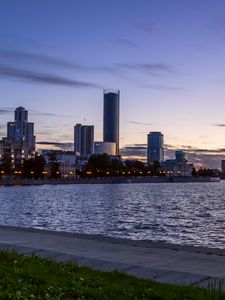 Preview wallpaper coast, sea, buildings, lights, twilight, city