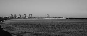 Preview wallpaper coast, sea, bw, beach, buildings