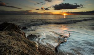 Preview wallpaper coast, sea, clouds, sun, sunset
