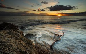 Preview wallpaper coast, sea, clouds, sun, sunset