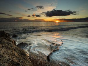 Preview wallpaper coast, sea, clouds, sun, sunset