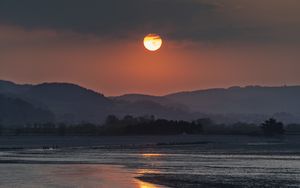 Preview wallpaper coast, sea, hills, sun, sunset