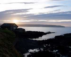 Preview wallpaper coast, sea, house, sunrise