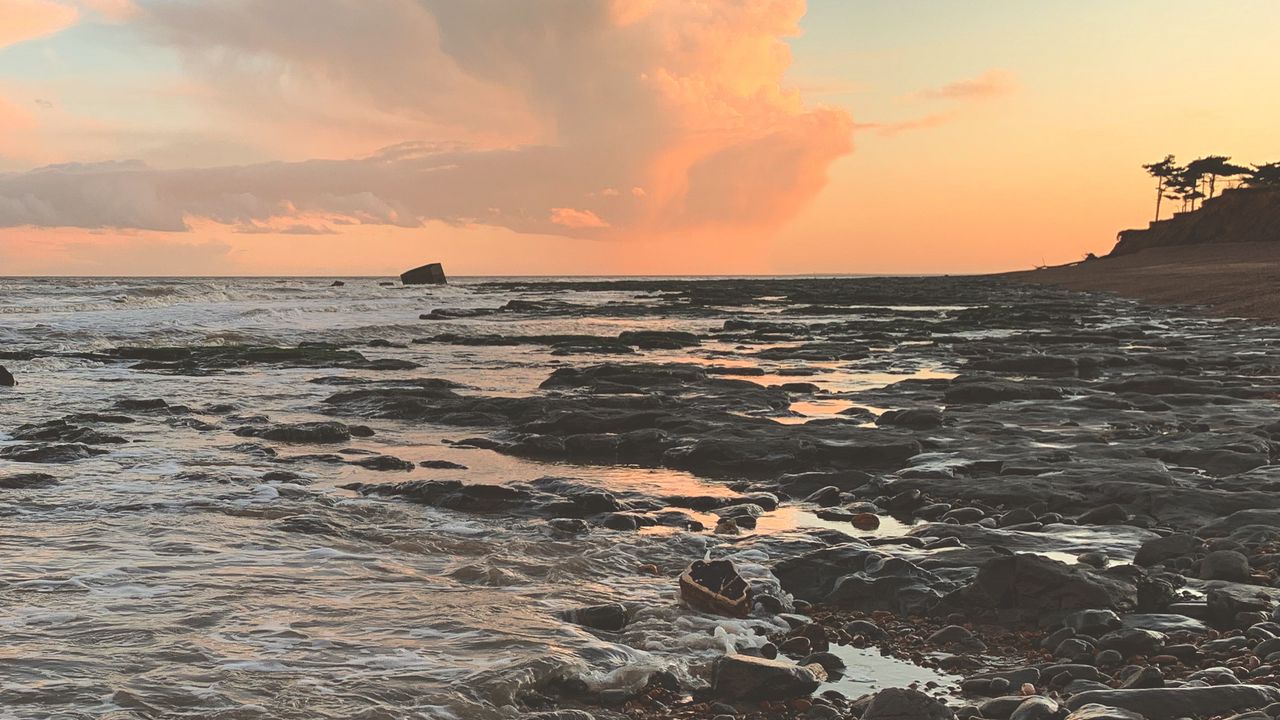 Wallpaper coast, sea, pebbles, stones, sunset