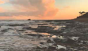 Preview wallpaper coast, sea, pebbles, stones, sunset