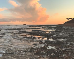 Preview wallpaper coast, sea, pebbles, stones, sunset