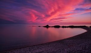 Preview wallpaper coast, sea, pebbles, stones, sunset, nature