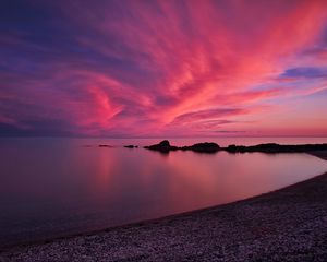 Preview wallpaper coast, sea, pebbles, stones, sunset, nature