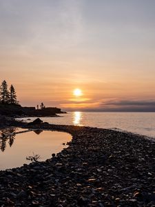 Preview wallpaper coast, sea, pebbles, nature, sunrise