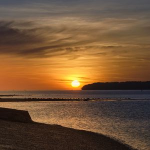 Preview wallpaper coast, sea, pier, sunset, hills