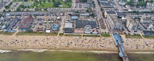 Preview wallpaper coast, sea, pier, buildings, beach