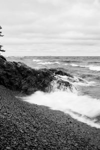 Preview wallpaper coast, sea, waves, stones, nature, black and white