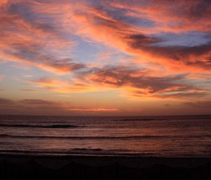 Preview wallpaper coast, sea, waves, clouds, sunset, dark