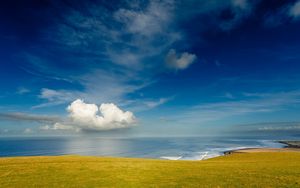Preview wallpaper coast, sky, cloud, ocean, meadow, glade, land, blue, green