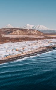 Preview wallpaper coast, snowy, aerial  view, water, mountains, landscape