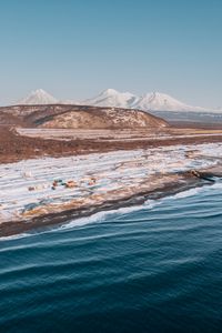 Preview wallpaper coast, snowy, aerial  view, water, mountains, landscape