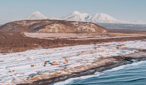 Preview wallpaper coast, snowy, aerial  view, water, mountains, landscape