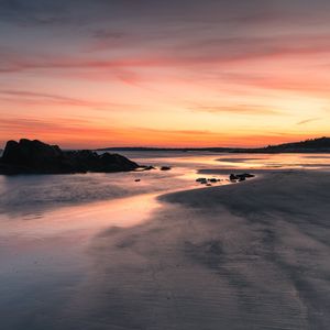 Preview wallpaper coast, stones, horizon, sunset, dark