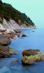 Preview wallpaper coast, stones, moss, rocks, smooth surface, silence