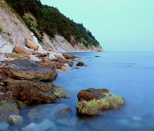 Preview wallpaper coast, stones, moss, rocks, smooth surface, silence