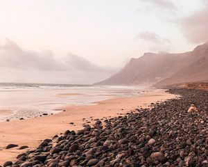 Preview wallpaper coast, stones, pebbles, rocks, sea