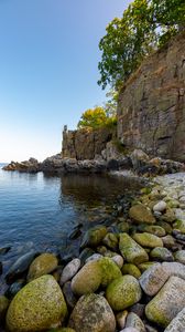 Preview wallpaper coast, stones, pebbles, rock, sea