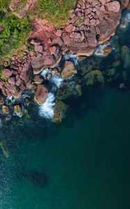 Preview wallpaper coast, stones, rocks, sea, aerial view