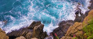 Preview wallpaper coast, stones, rocks, sea, aerial view, surf