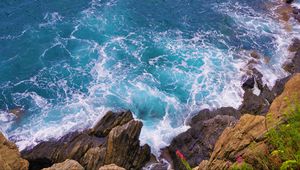 Preview wallpaper coast, stones, rocks, sea, aerial view, surf