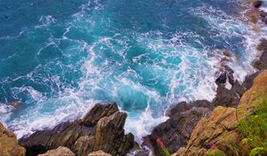 Preview wallpaper coast, stones, rocks, sea, aerial view, surf