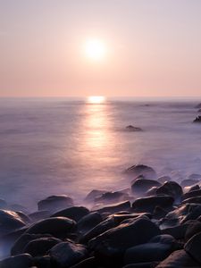 Preview wallpaper coast, stones, rocks, sun, water, fog, landscape