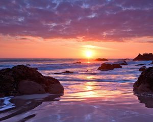 Preview wallpaper coast, stones, sand, wet, decline, horizon, sea, sky, clouds, romanticism